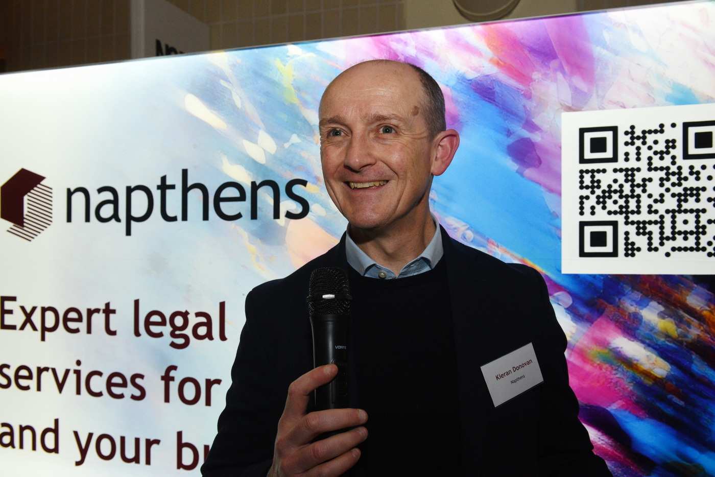 Lawyer gives a presentation speech at an evening event