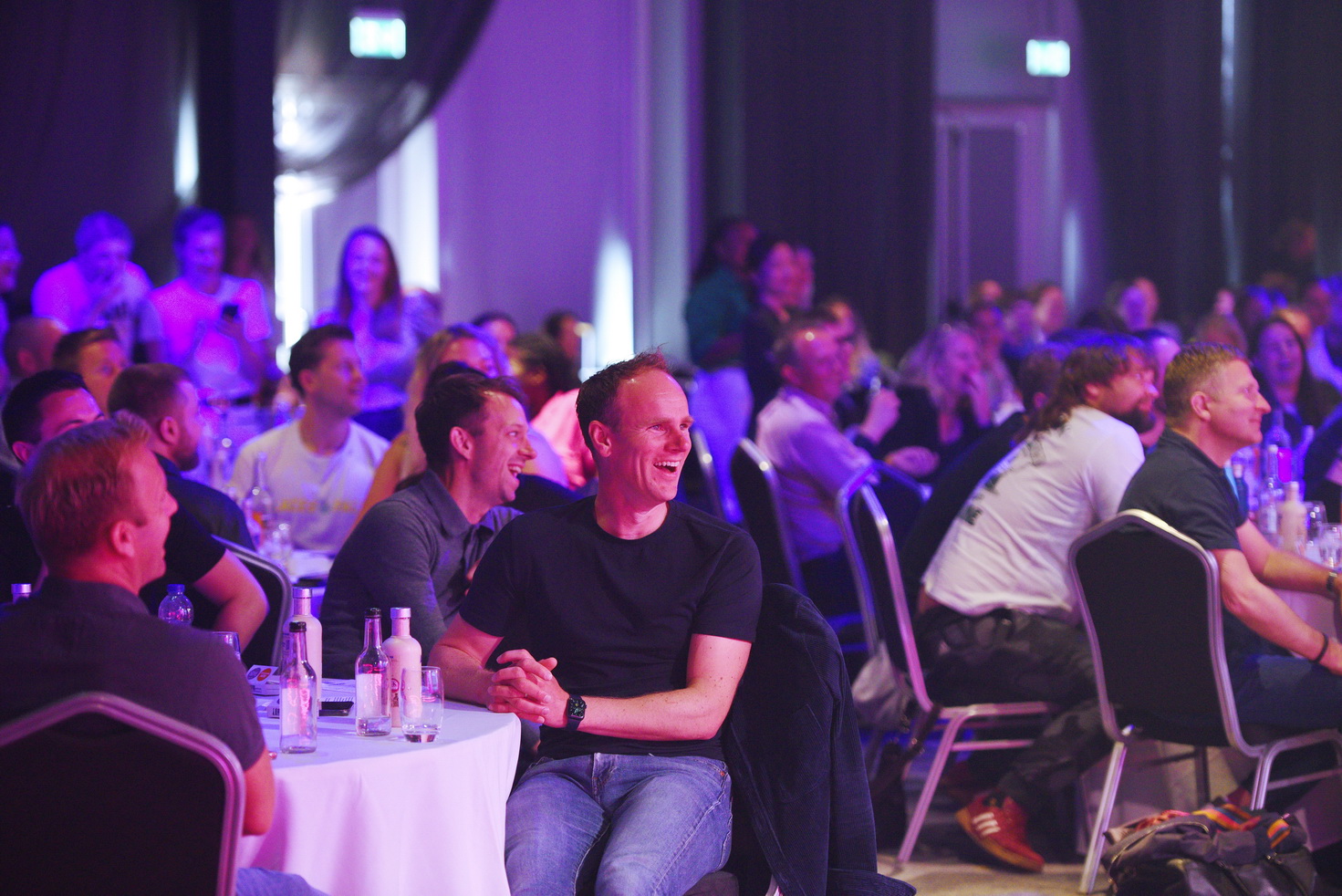 Audience reactions at corporate event