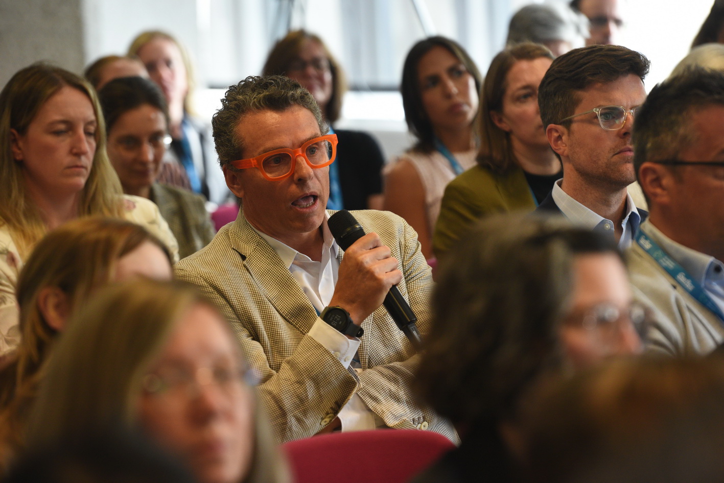 Audience questions at conference