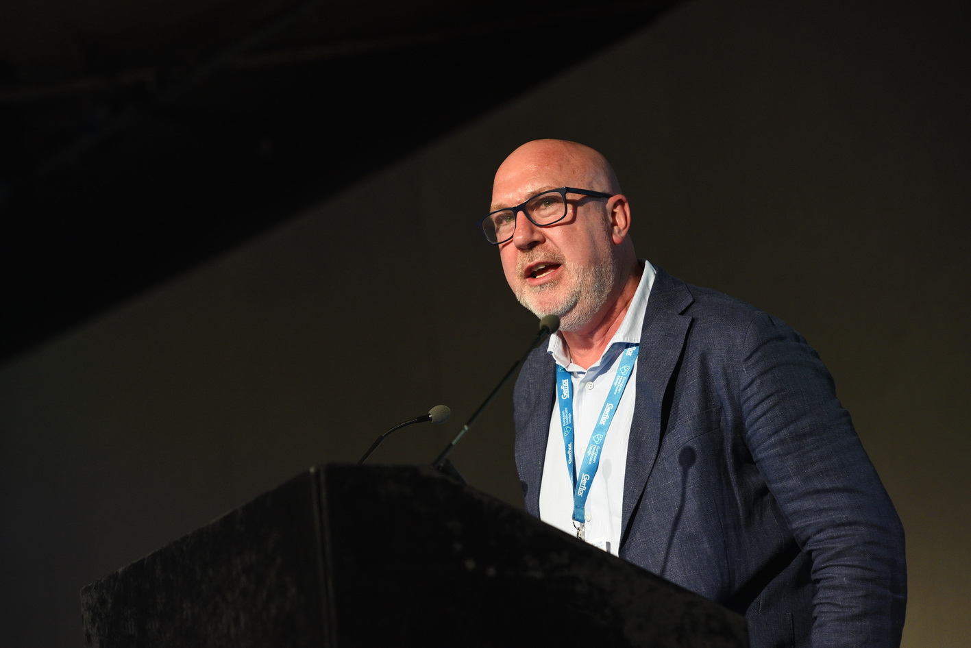 Conference speaker presenting