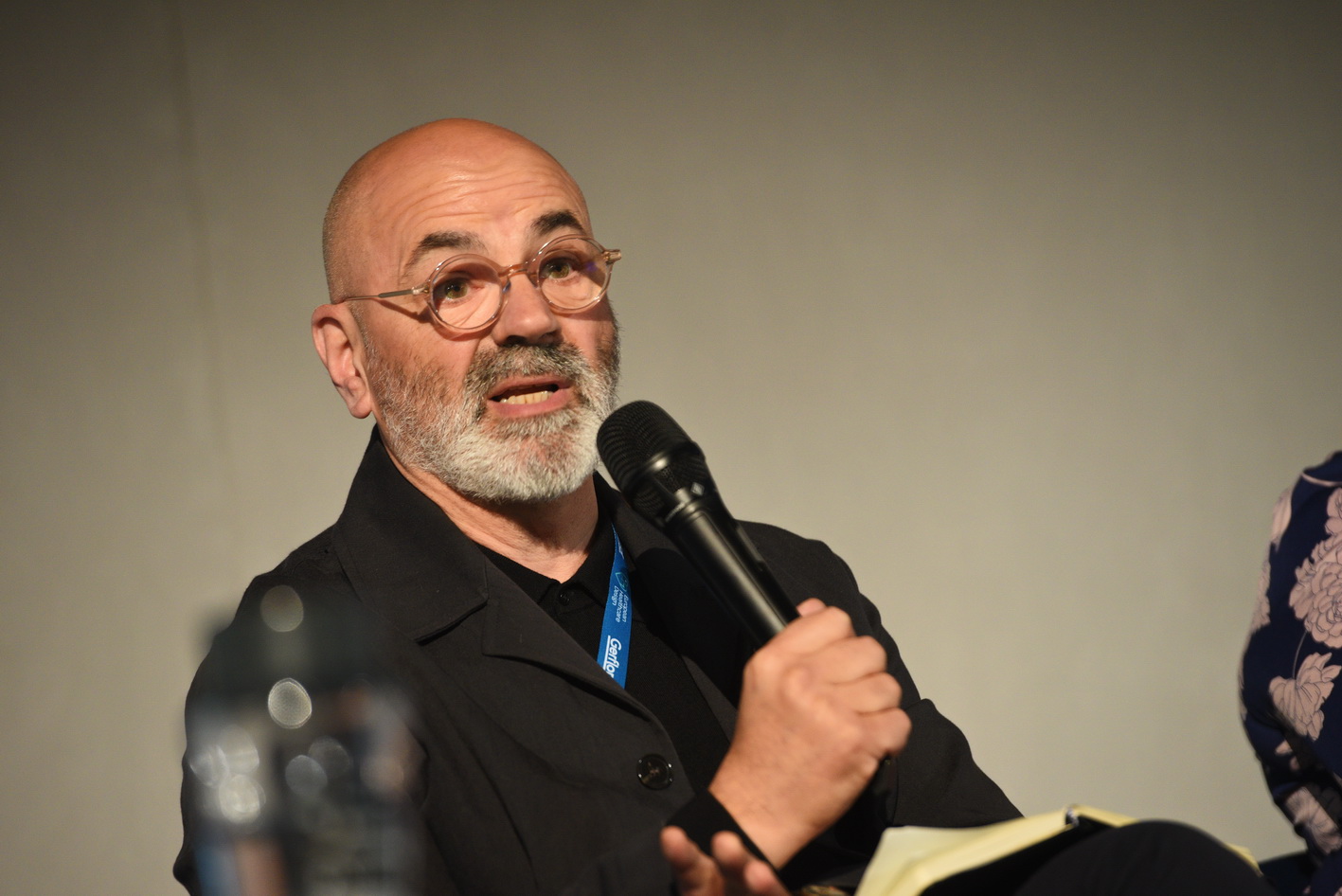 Expert speaking at conference
