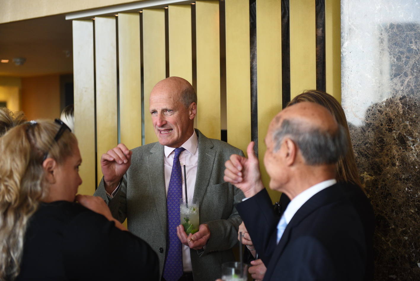 Delegates networking with colleagues at event photography