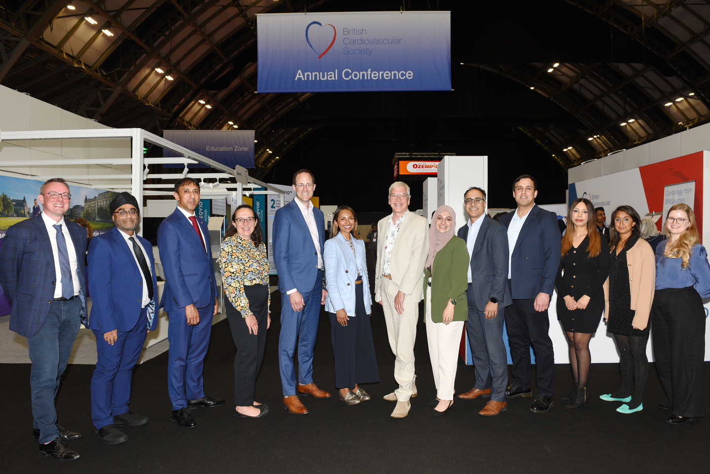 Large group photograph of staff at a conference