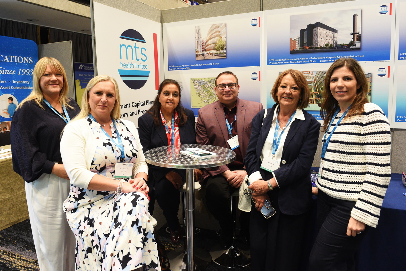 Close up photography of delegate taking a photo on their phone