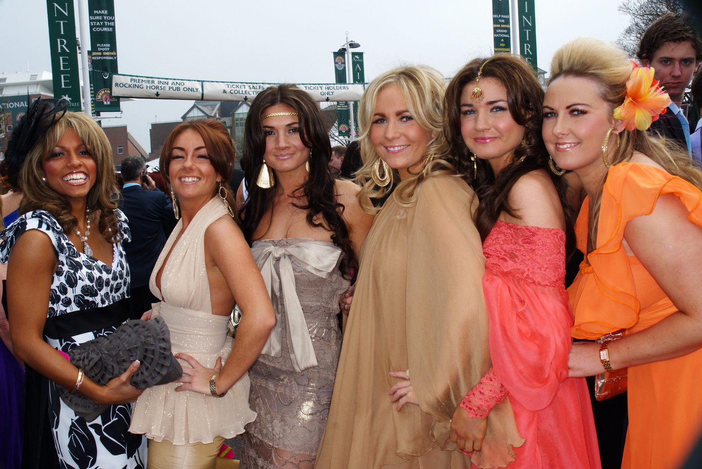 PR photo of racegoers for The Racing Post - a group of ladies dressed up for the Grand National, Liverpool