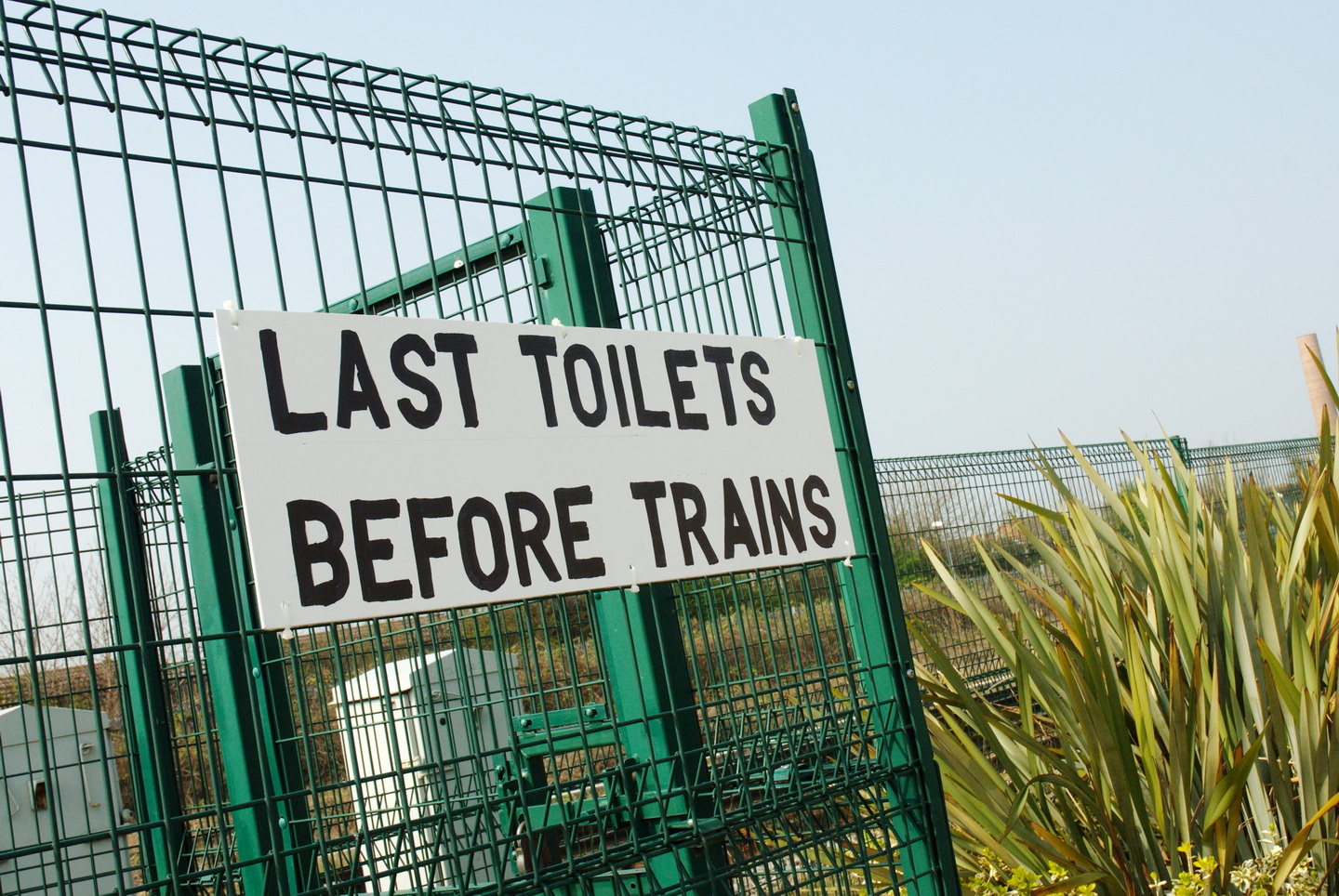 Public relations photography for The Racing Post - sign near the exit at Aintree Last Toilets Before Trains back to Liverpool city centre